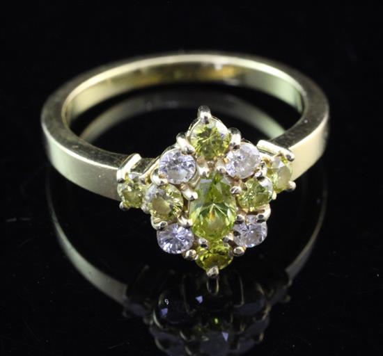 An 18ct gold and three colour diamond dress ring, size N.